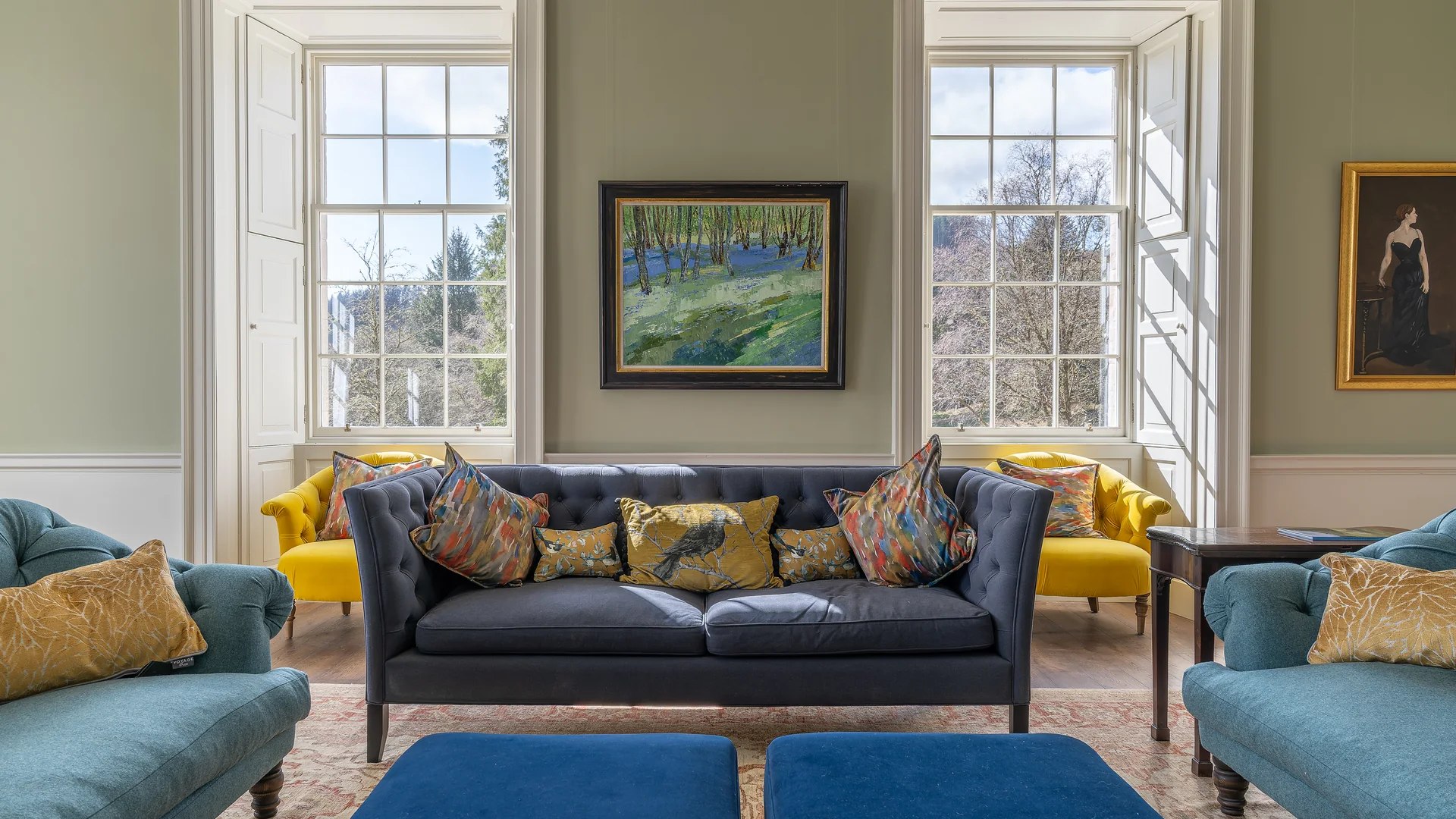 The restored drawing room at Asknish House, Argyll: lime plaster walls, reinstated cornice and cast ceiling rose, panelled shutters and a new oak floor, all completed by LTM as principal contractor