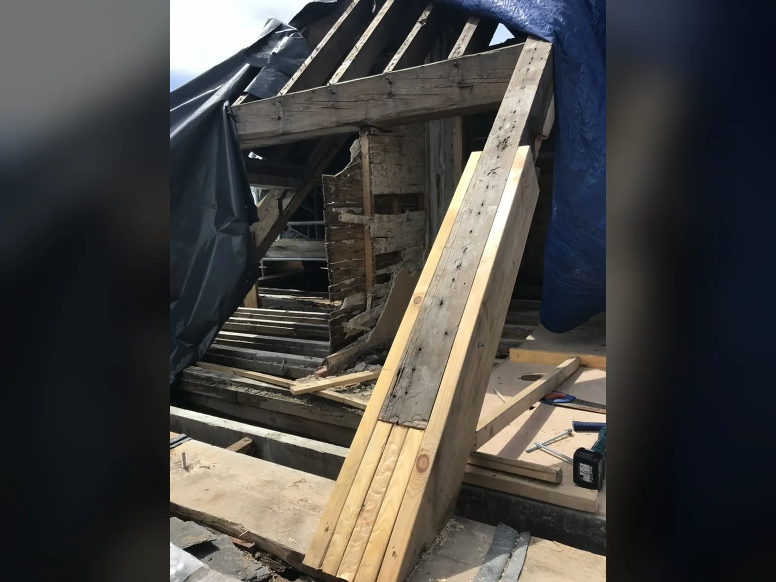 New timber spliced and bolted to an original roof timber, keeping the sound section in place