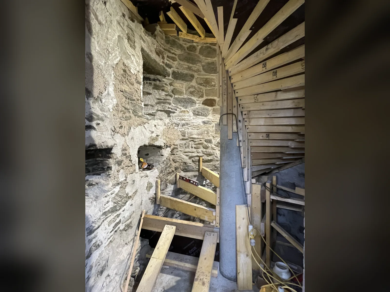 Fairburn Tower: timber formwork and treads for the new turnpike stair, set out around the newel