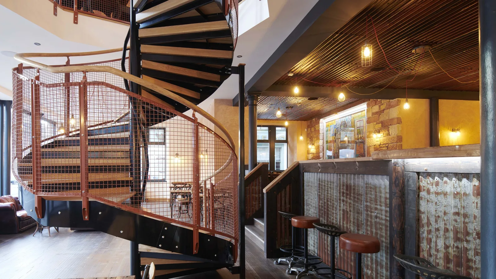 Rose Street Foundry, Inverness: the bar, made by our joiners from joists salvaged from the building, beside the spiral stair