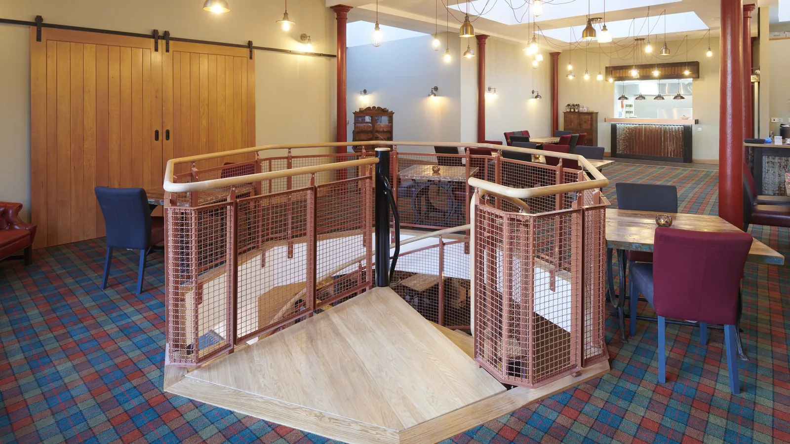 Rose Street Foundry: the first-floor restaurant, with timber sliding doors and the stair surround