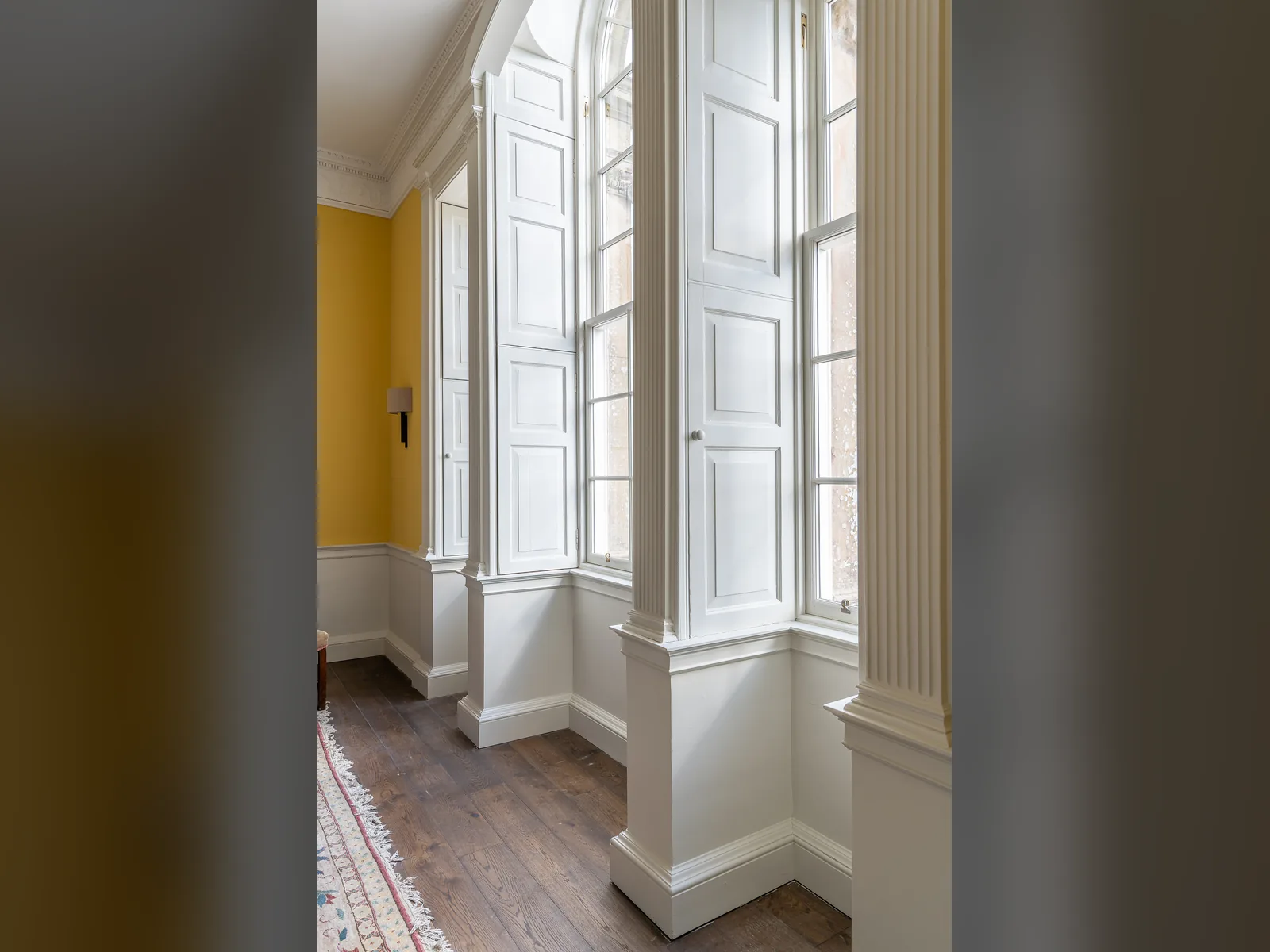 Asknish House: a deep window bay with panelled shutters, boxings and pilasters, recorded, taken down, repaired and refitted