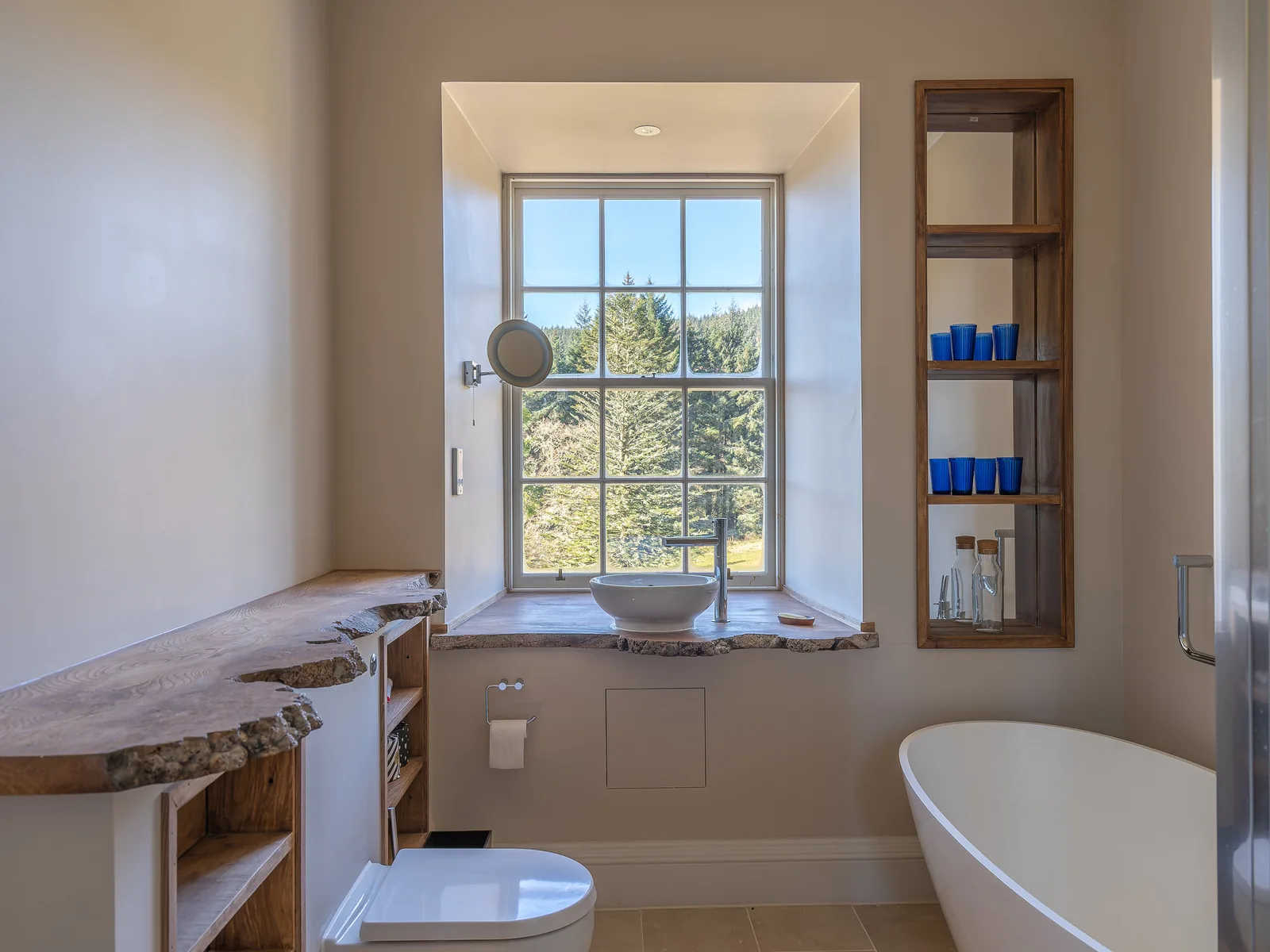 Asknish House: an oak vanity top with its natural edge left on, made and fitted in a bathroom