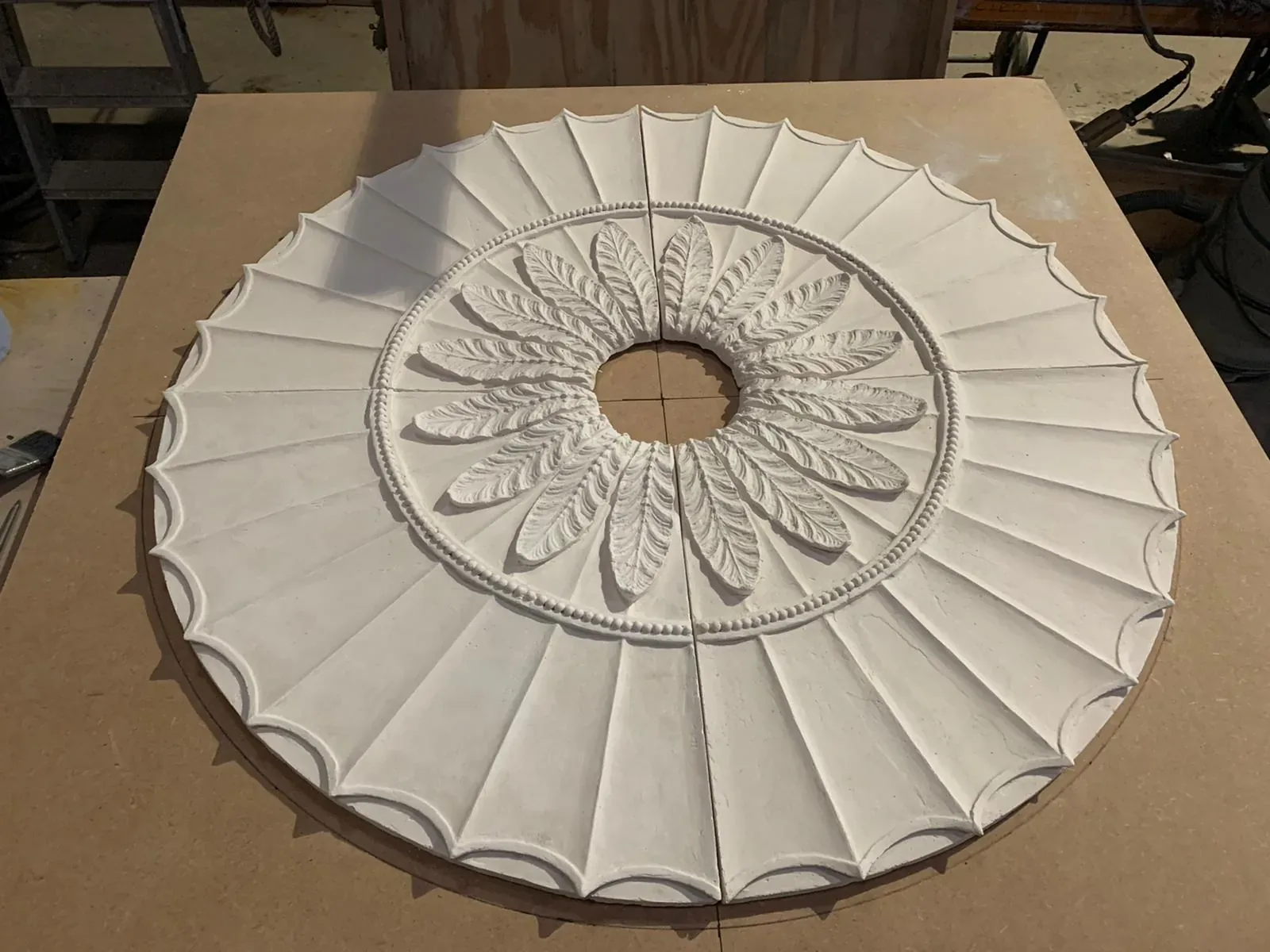 A ceiling rose cast and cleaned up ready for fixing