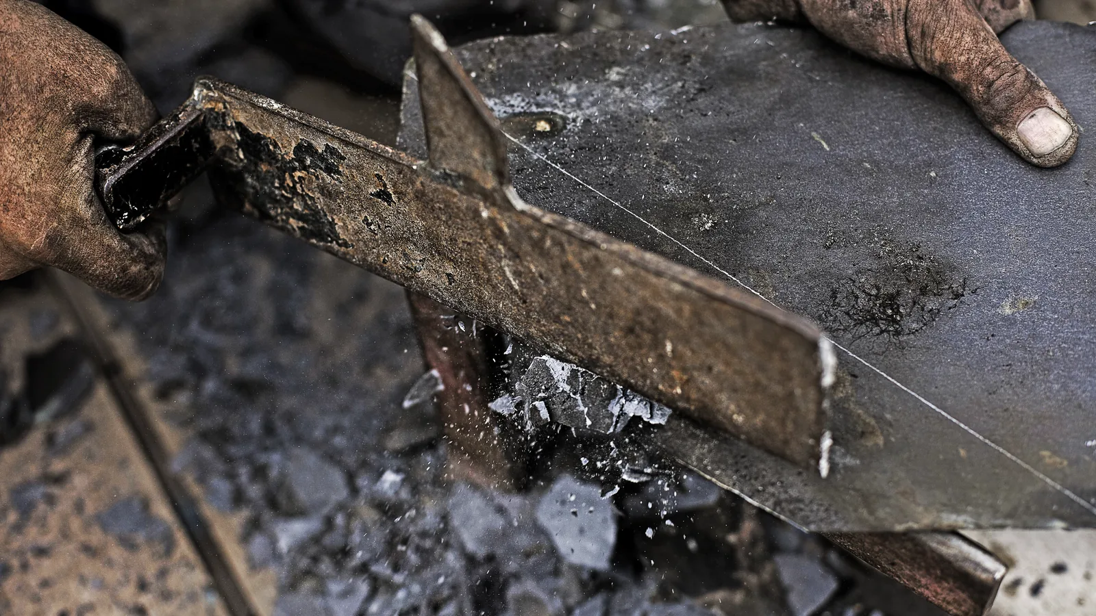 Slate cut and dressed by hand on the scaffold