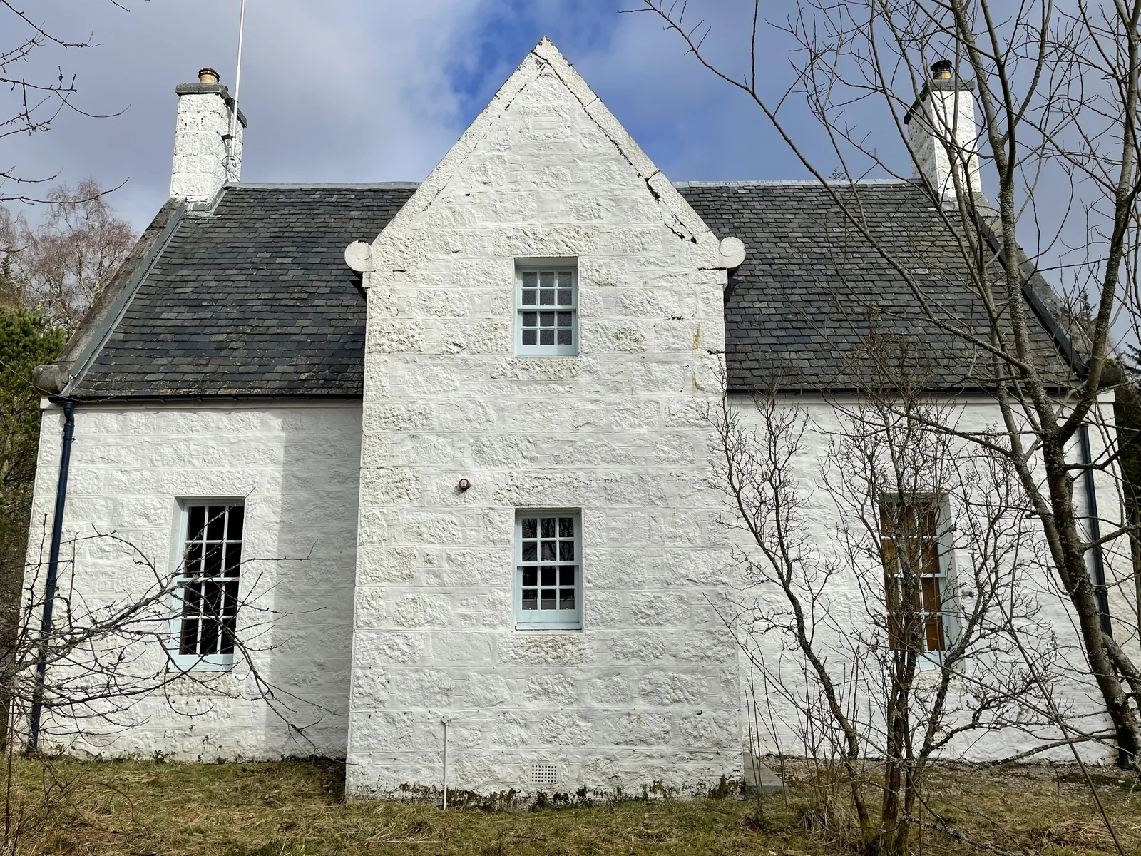 Corrour Estate as found: estate cottages that had been repointed in cement and painted, trapping water in the granite walls