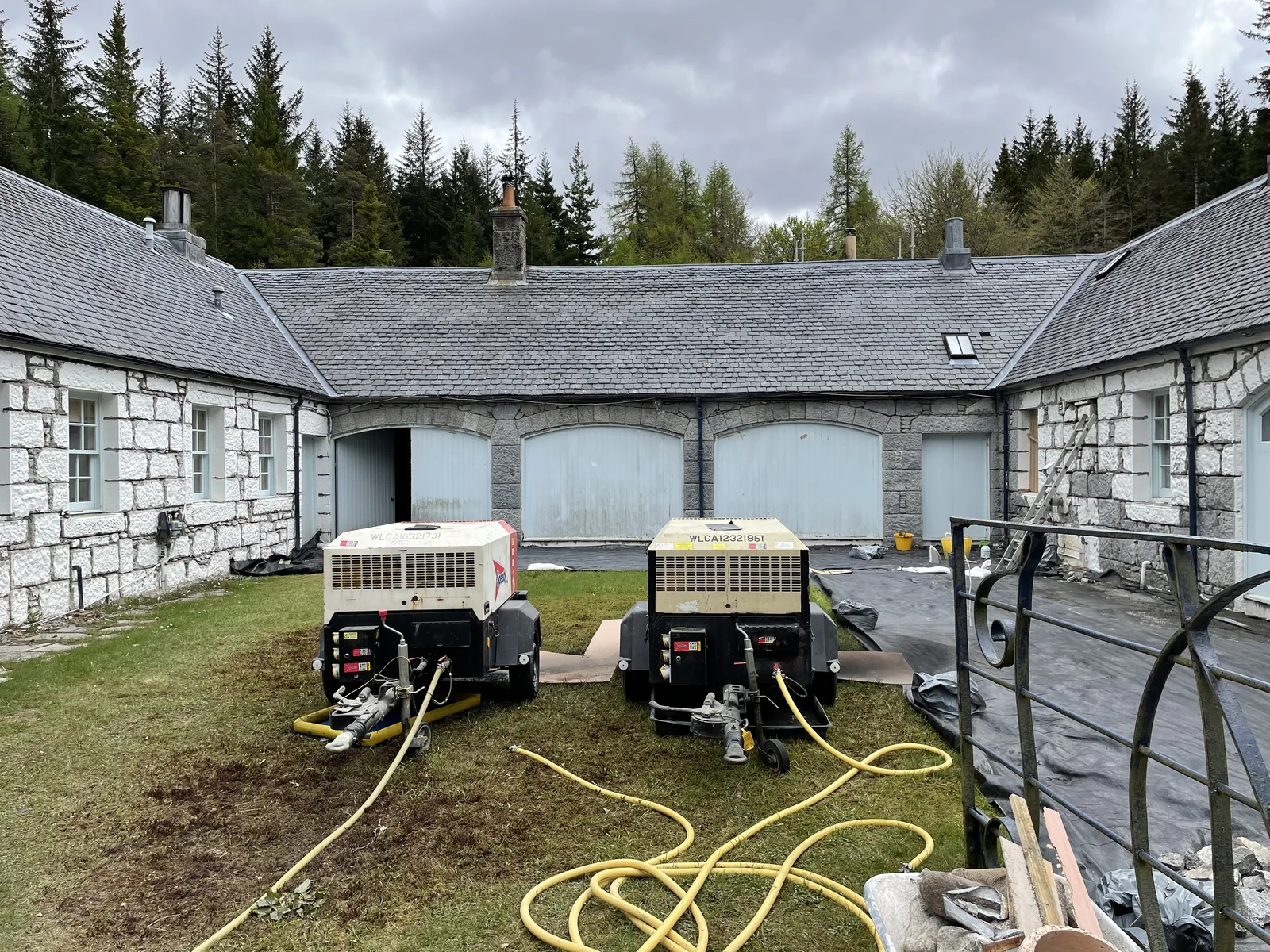 The cleaning plant in the courtyard at Corrour: the compressor and pressure pots that feed the TORC nozzle, in one of the most remote villages in Scotland