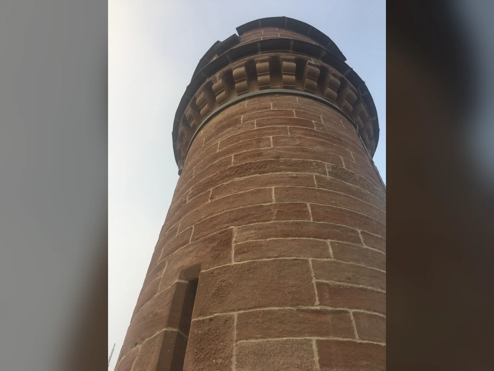 Inverness Castle: the north tower cleaned with the DOFF steam system and repointed in lime, the ashlar tooling and the corbelled parapet crisp again