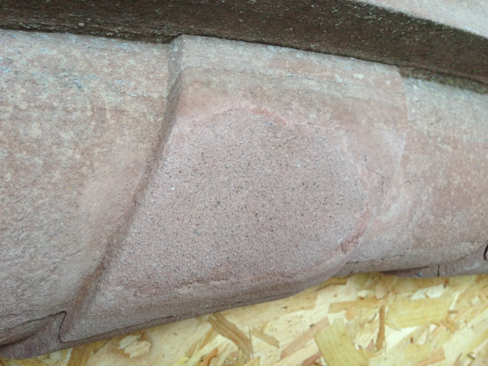 The same moulding after repair, the loss made good in a matched mortar and the profile carried through