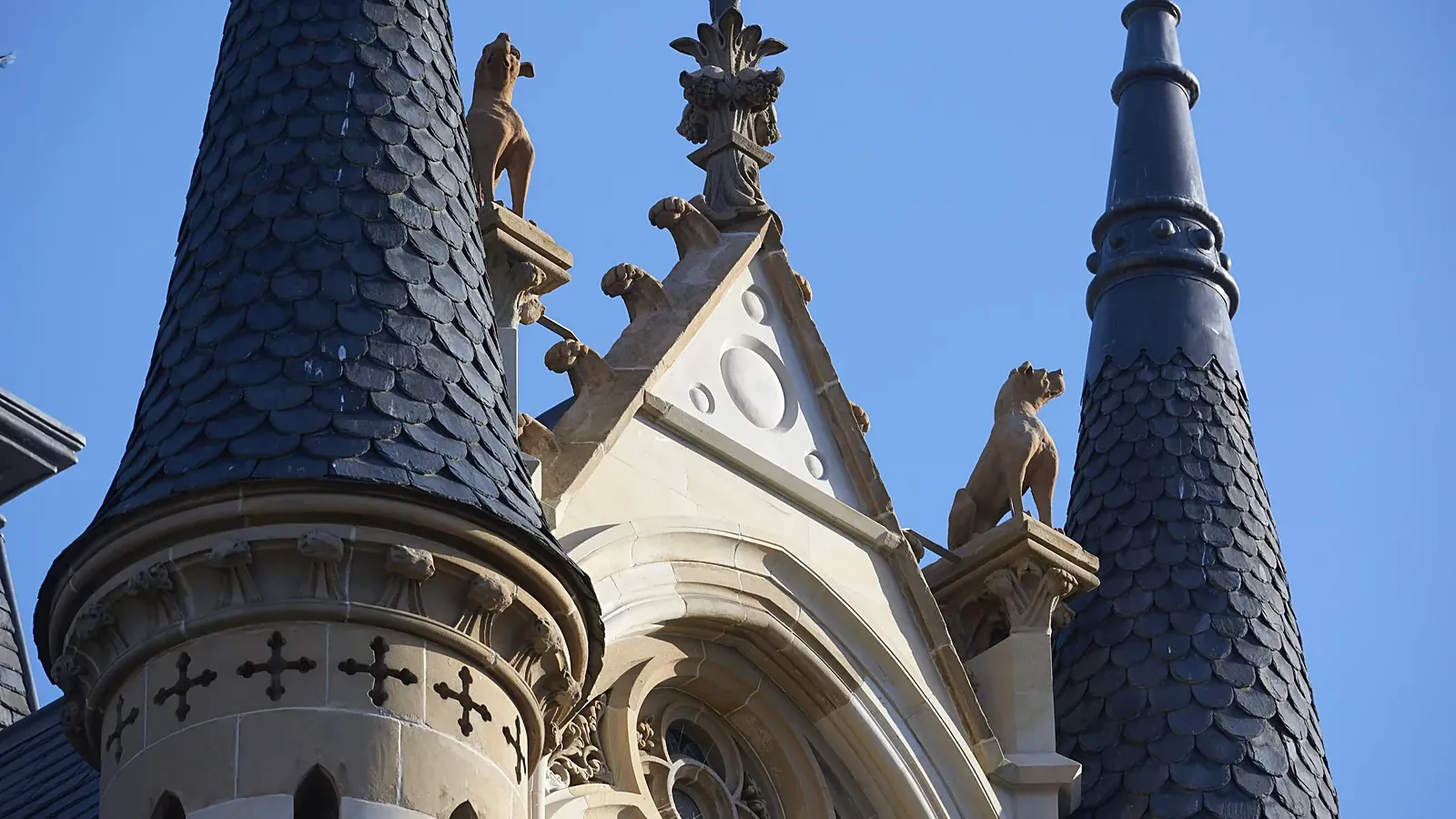 Inverness Town House: the turret pinnacles and carved finials of the Category A listed civic building, conserved and, where decayed past repair, replaced by LTM masons over three phases of work