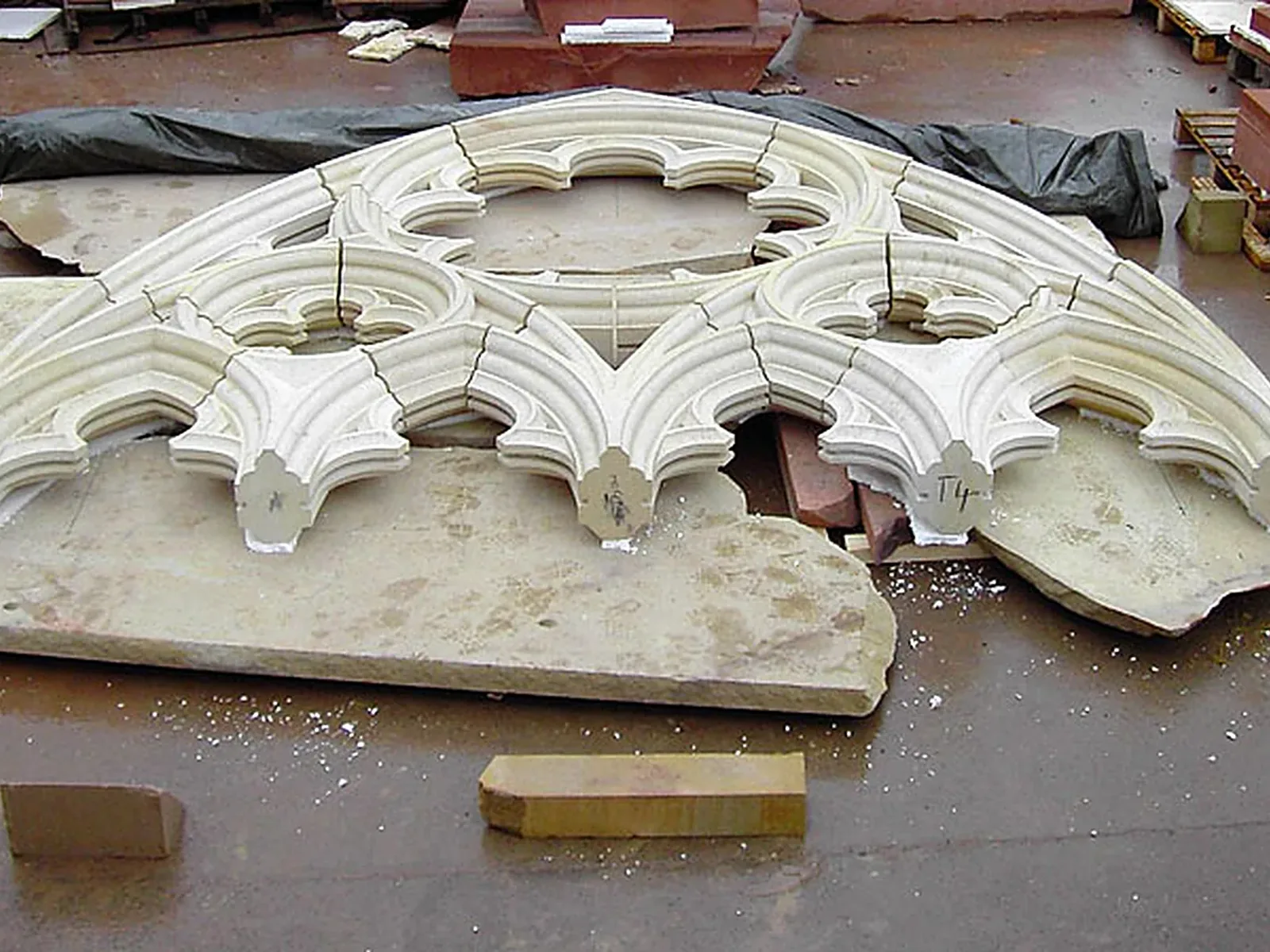 Larbert East Church: the complete new sandstone tracery window laid out on the scaffold before it was fixed