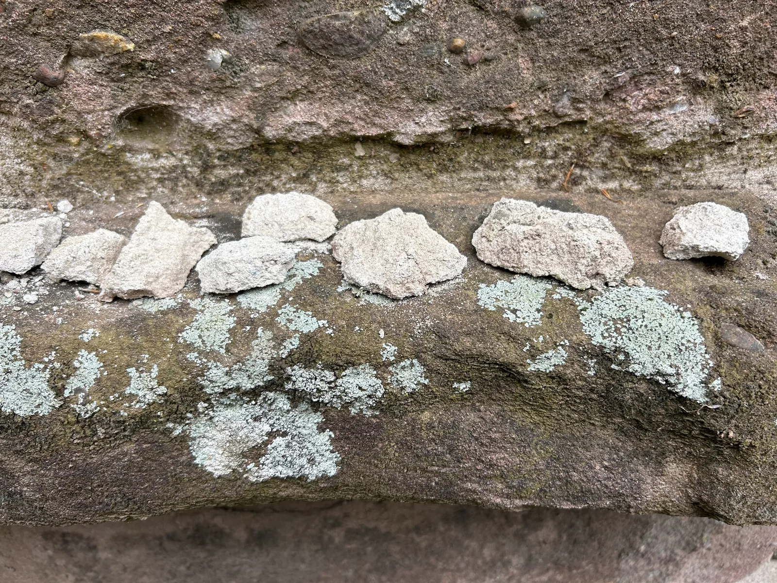 Fragments of the existing lime mortar bagged for visual analysis of binder, aggregate and grading