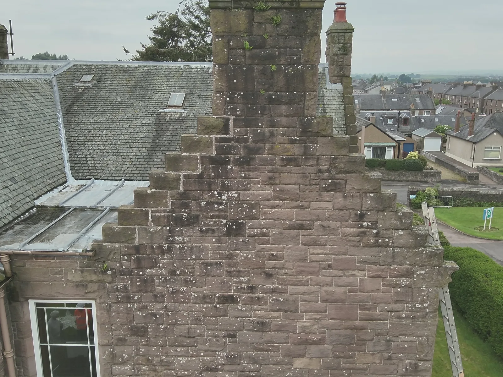 Lowson Manse from the drone: the red snecked rubble gables, chimneys and skews inspected without scaffold