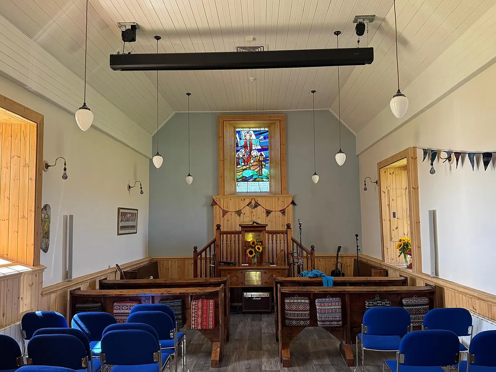 Papa Stour Kirk, Shetland: the 1806 kirk finished inside with an insulating lime plaster system and insulated ceilings, now a warm community centre on an island of fifteen people