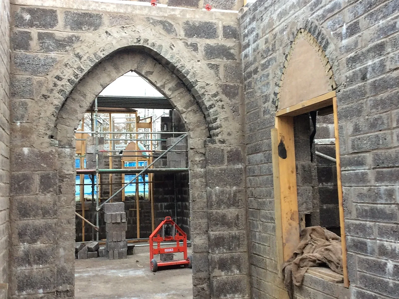 A sixteenth-century tower house in Ayrshire: the new family chapel and cloister link built in dressed stone, lime harl and slate as part of a £1m to £1.5m contract
