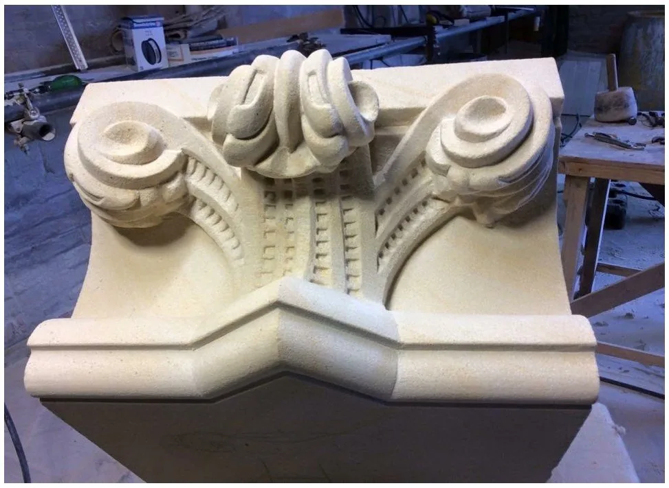 Finished carved capital