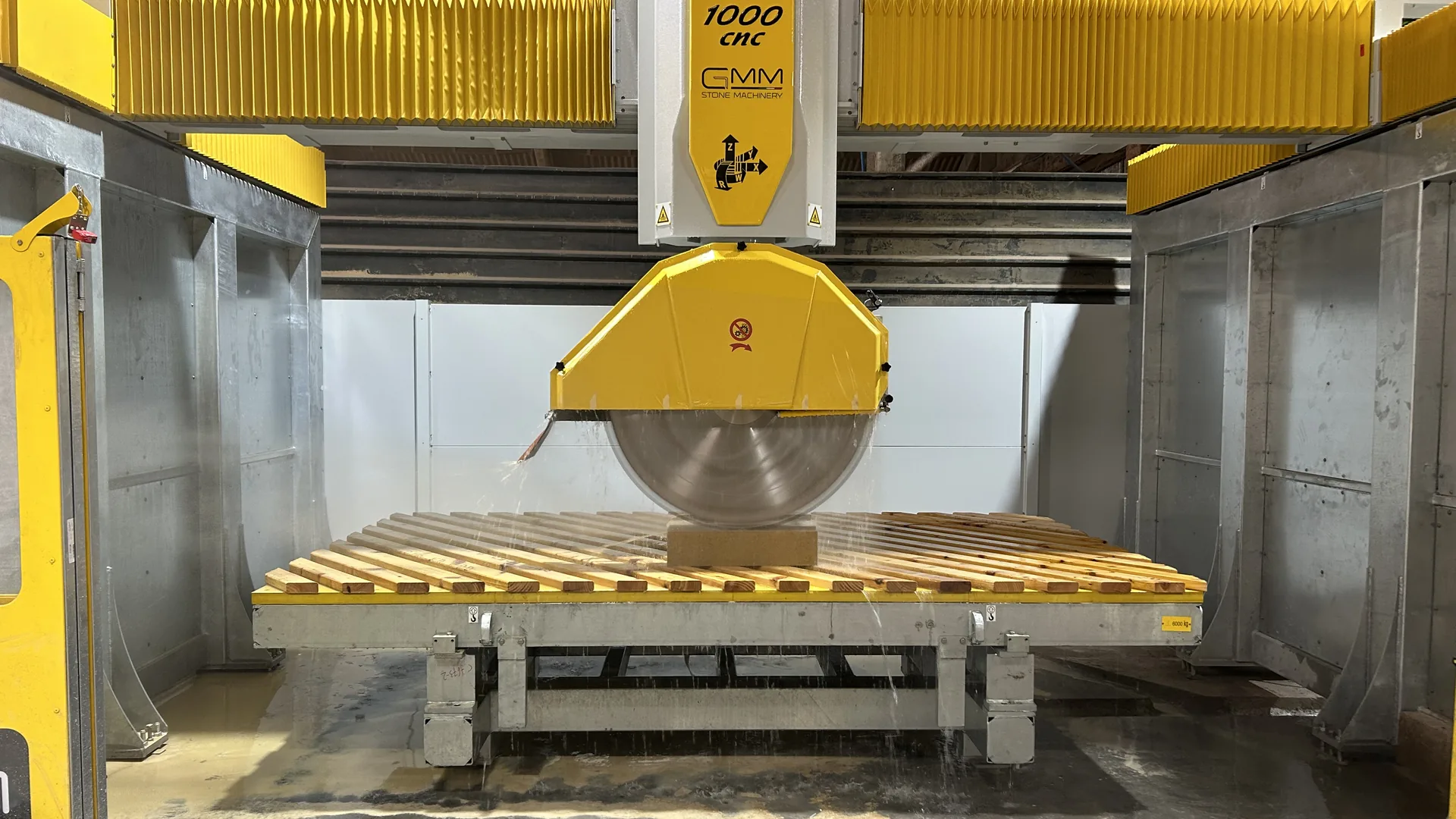GMM Litox 1000 CNC five-axis bridge saw in the LTM stone production workshop